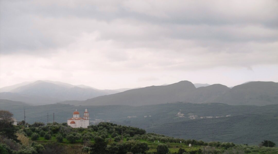 Rolling green hills of Zagorje with a small chapel